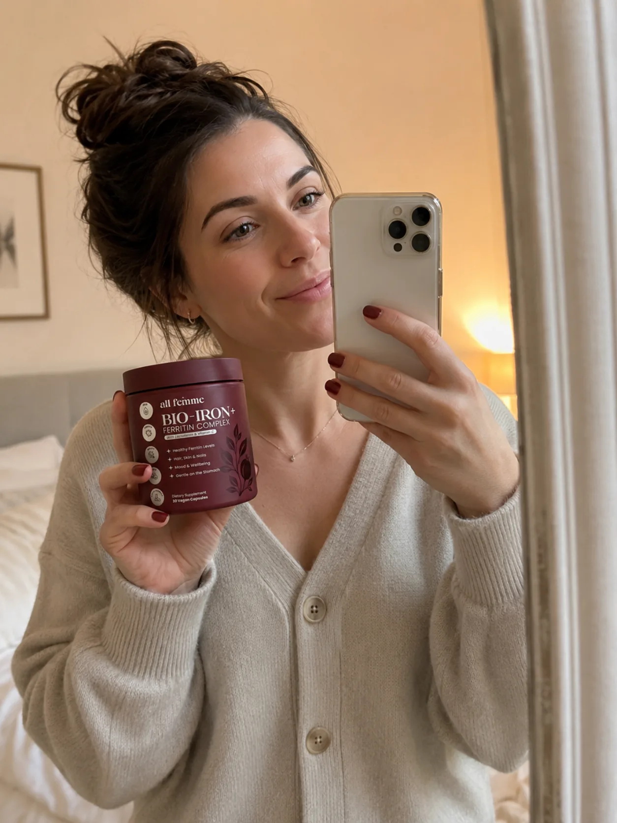 Melissa T. holding her Bio-Iron+ jar