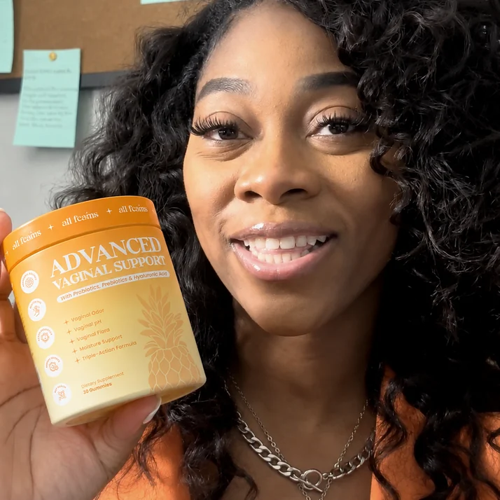 Imani R. holding a jar of Flora+