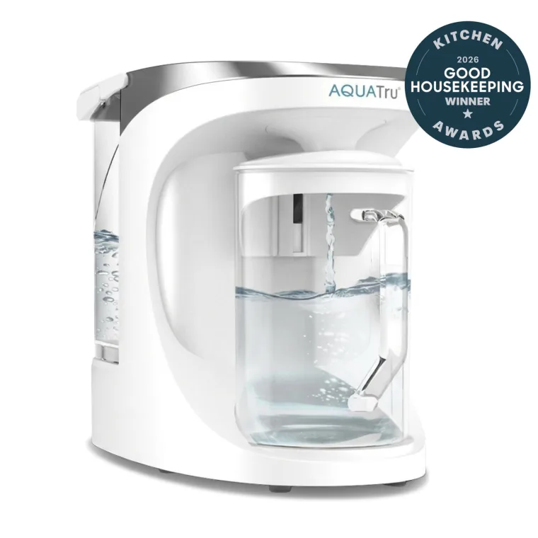 AquaTru Carafe countertop water purifier with its award badge