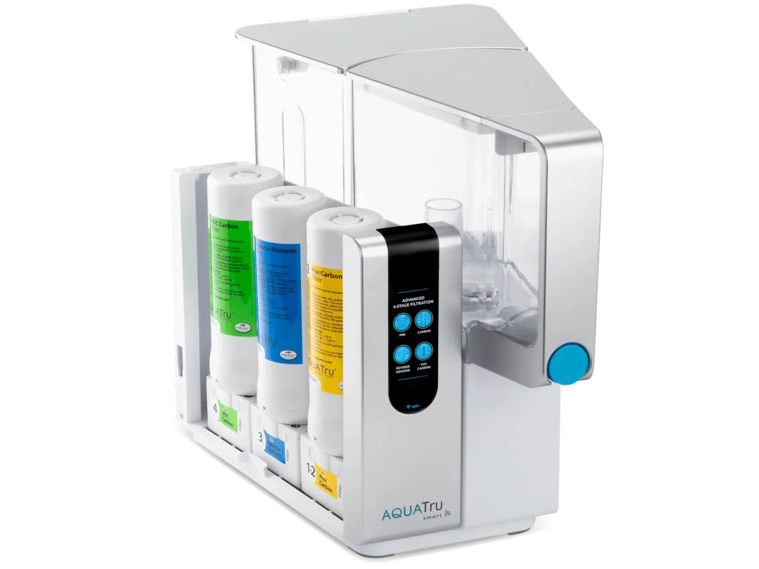 AquaTru Classic with its three filter cartridges visible behind the front door