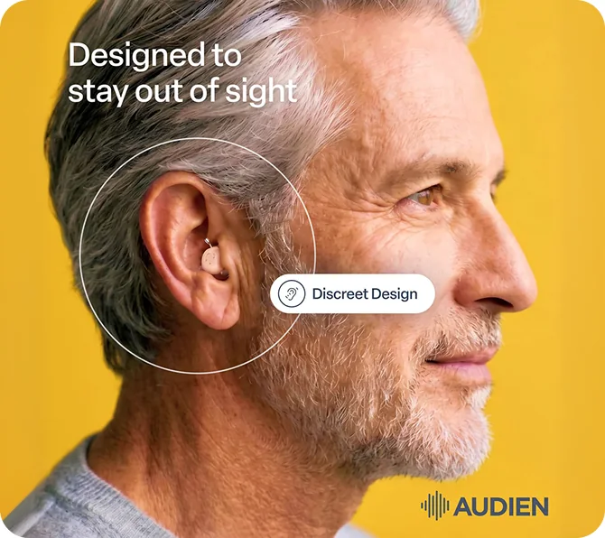 Profile of a grey-haired man with a circular callout over his ear reading Discreet Design and the line Designed to stay out of sight