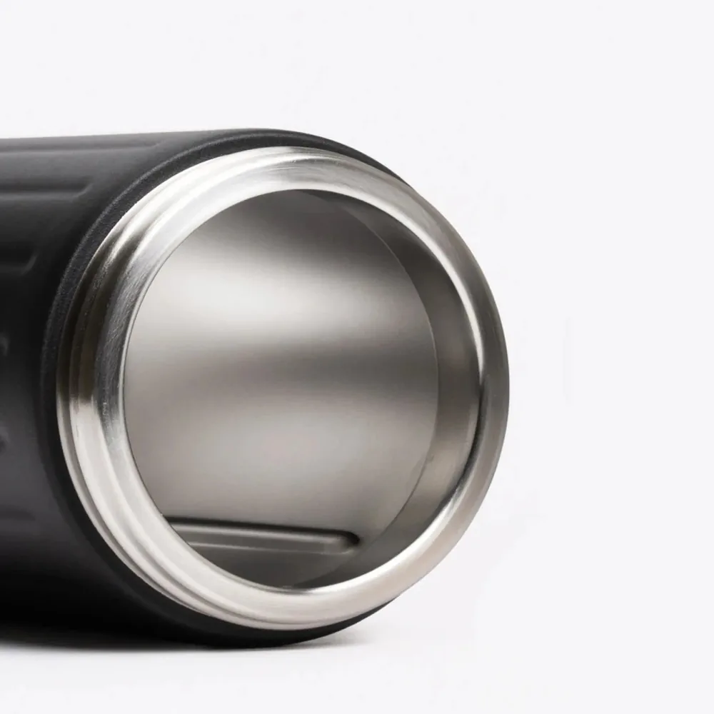 Close view into the open mouth of a Beast stainless steel blending vessel, showing the polished steel interior and the thickness of the rim