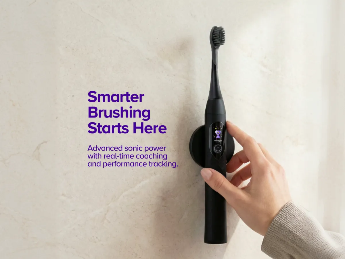Hand lifting the BURST Pro 2.0 sonic toothbrush from its magnetic wall mount, display lit