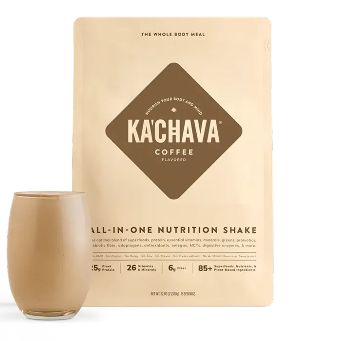 A bag of Ka'Chava next to a prepared shake in a glass