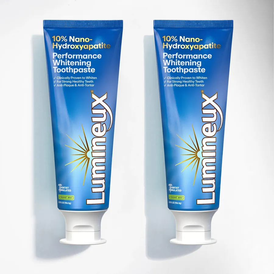 Two tubes of Lumineux ten percent nano-hydroxyapatite performance whitening toothpaste.