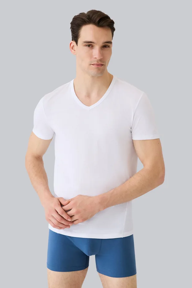 Man wearing the AIRKNITx Cotton V-neck undershirt in Bright White