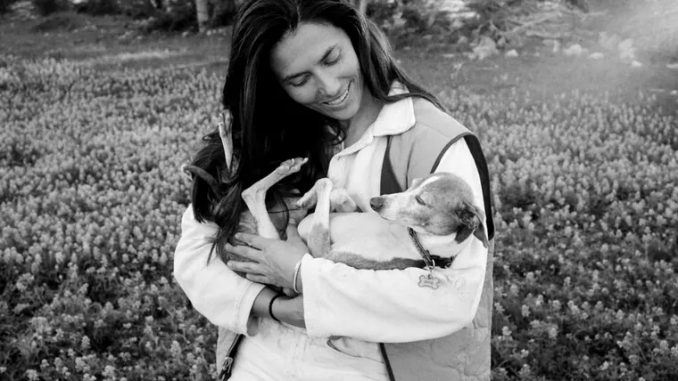 Katie Spies, founder and chief executive of Maev, holding her dog George