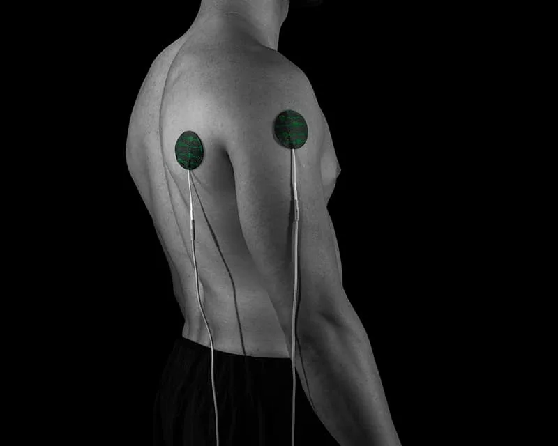 Two recovery electrodes placed on the back of a shoulder