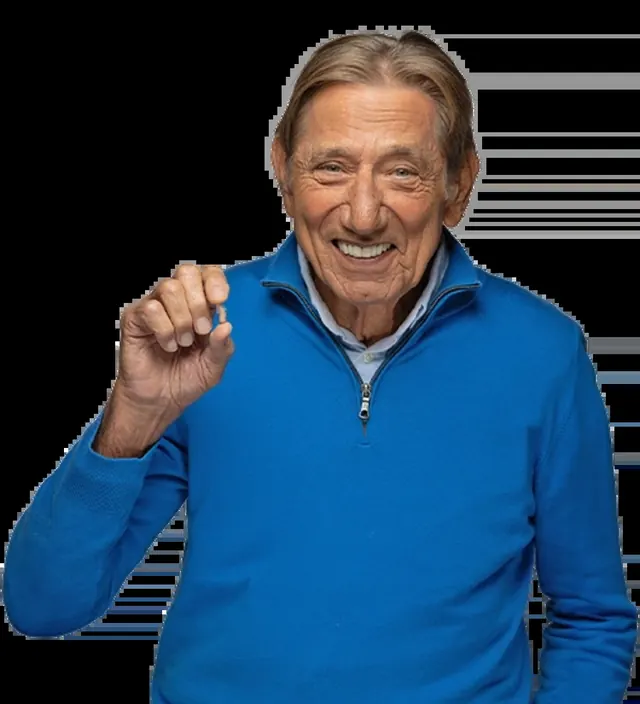Joe Namath, Pro Football Hall of Famer, in a blue quarter-zip pullover