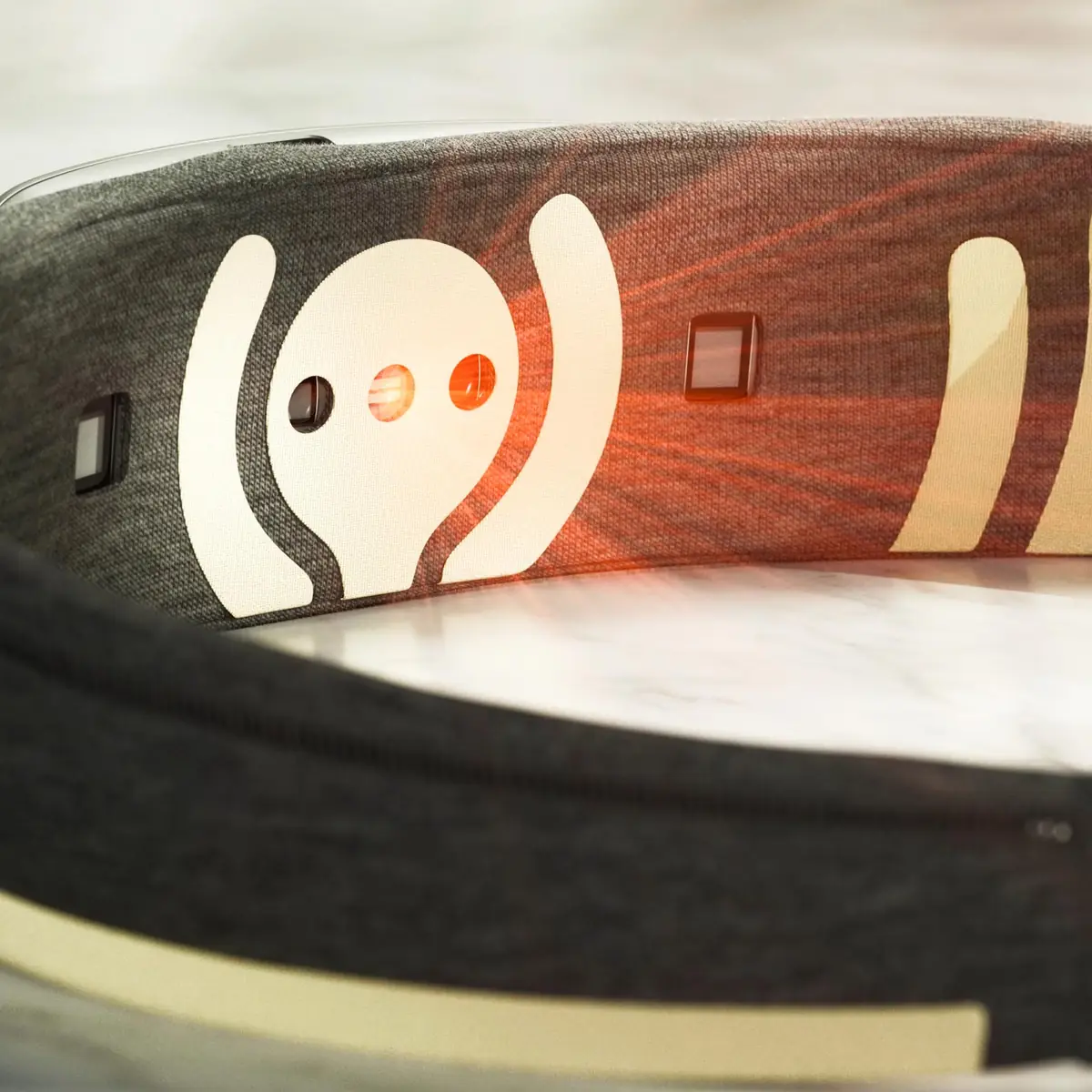 The Muse headband sensor array lit by the near infrared emitter used for blood oxygenation sensing