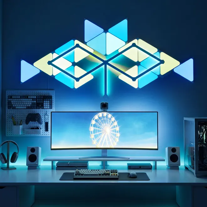 The same panels arranged as two diamond clusters in blue and yellow above an ultrawide monitor.