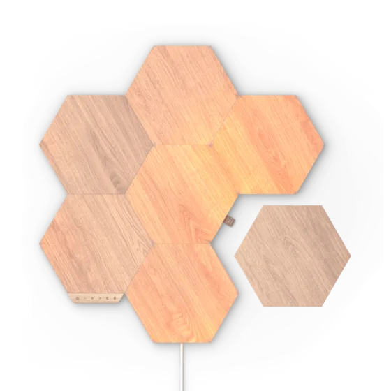 Nanoleaf Elements hexagonal panels finished in birchwood veneer.