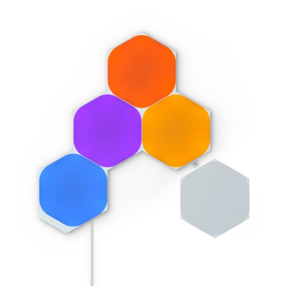 A stack of white hexagonal Nanoleaf Shapes panels with a controller.