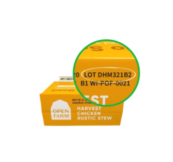 Open Farm wet food carton with the lot code circled on top