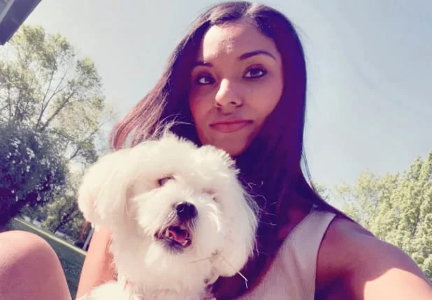 Kathelin holding her dog Lola