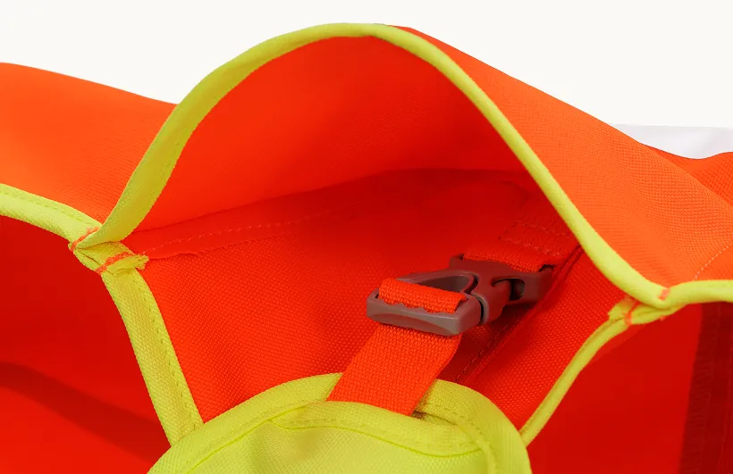The inside of the Lumenglow vest, showing the webbing strap and the side-release buckle