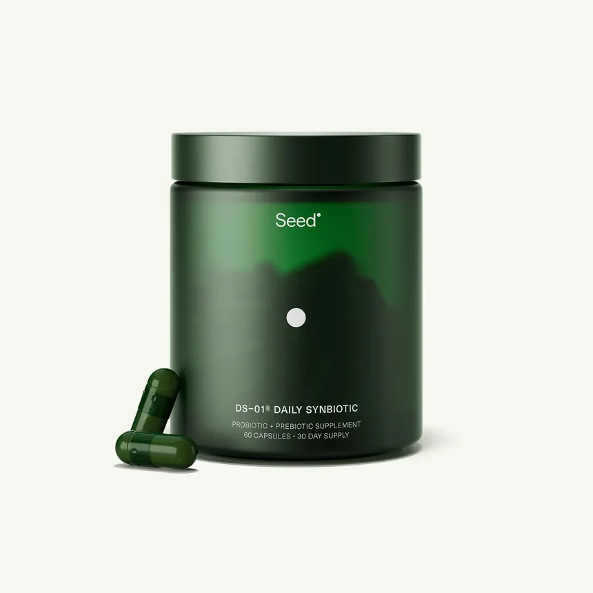 The DS-01 glass jar with two capsules beside it