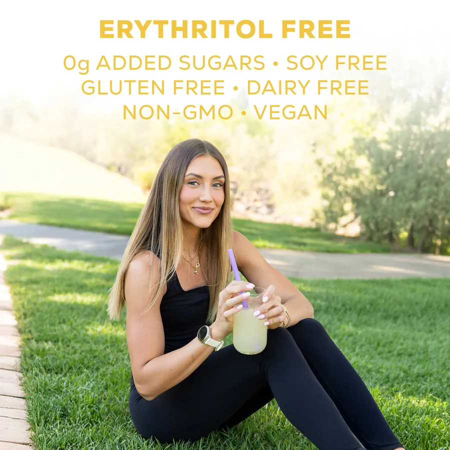 Woman sitting on grass drinking Clear Protein, with the product certifications listed